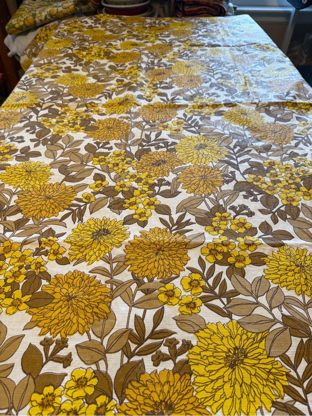 A classic vintage 1970s "flower power" vinyl tablecloth
